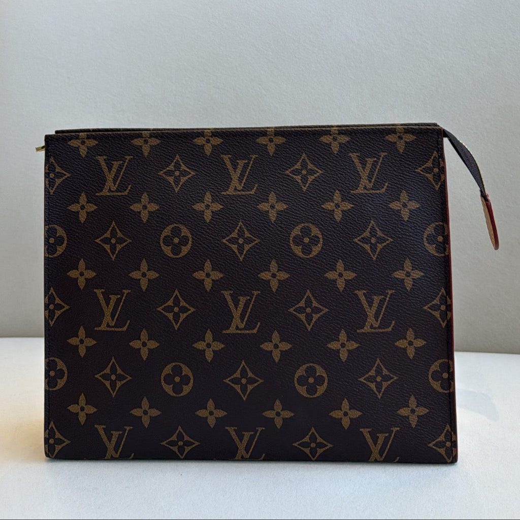 Louis Vuitton Poche Toilette Preloved